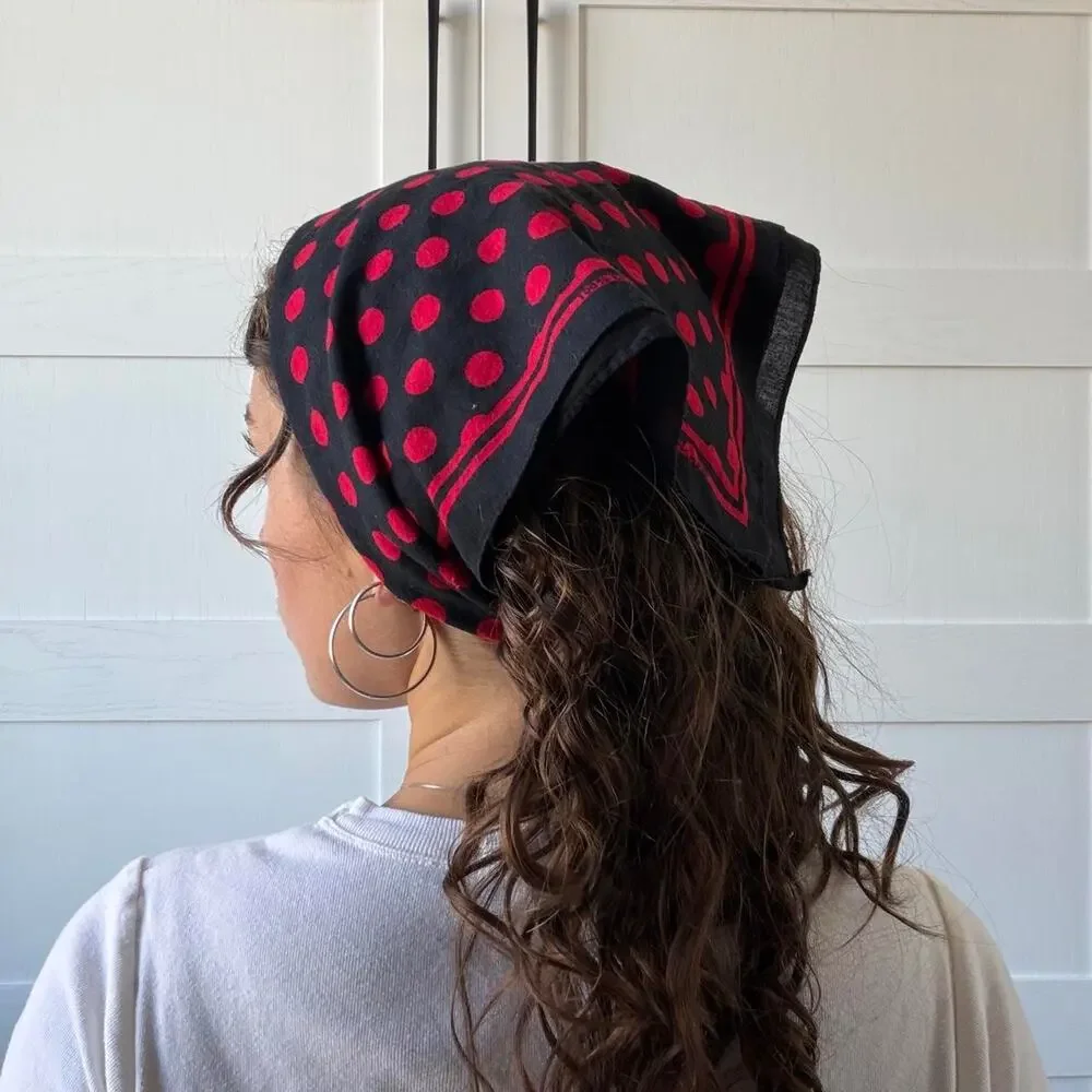 Vintage black cotton bandana featuring